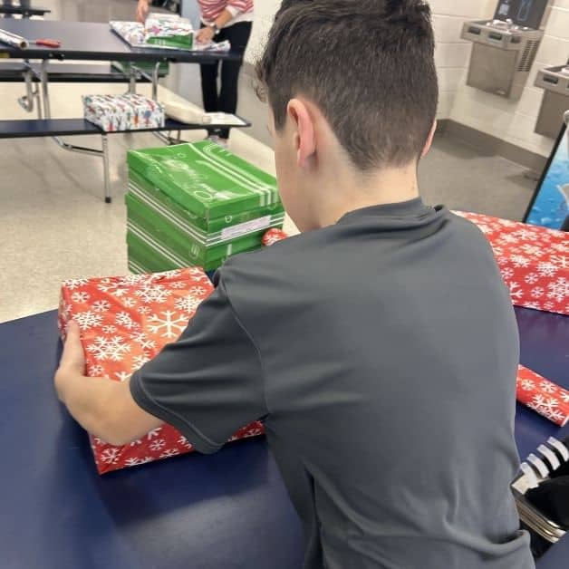 wrapping gifts for charity event